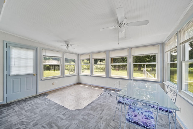8756 Portage Lake Rd, Munith, MI 49259 - unfurnished sunroom featuring a ceiling fan and outdoor dining space