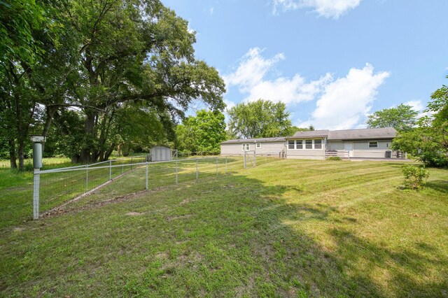 8756 Portage Lake Rd, Munith, MI 49259 - view of yard with a storage unit