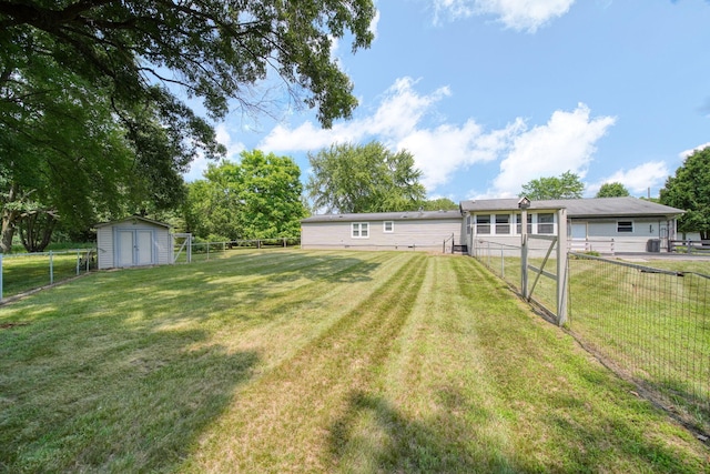 8756 Portage Lake Rd, Munith, MI 49259 - fenced backyard with a shed