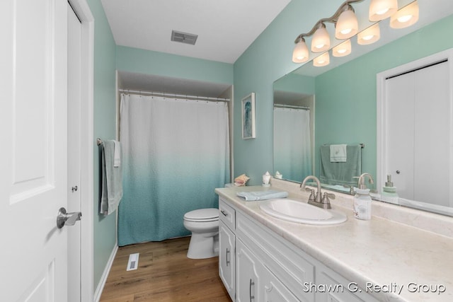 1060 Village Ln, Jenison, MI 49428 - full bath with vanity and wood finished floors
