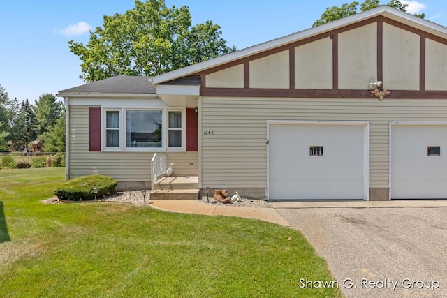 1060 Village Ln, Jenison, MI 49428 - view of front facade featuring a front yard