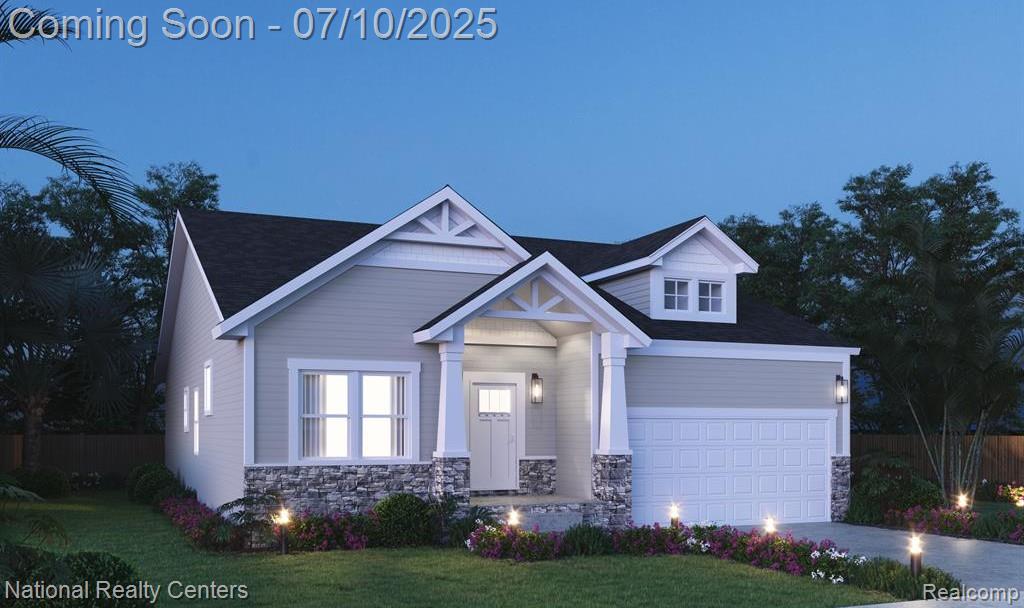 20640 Meadowview St, Livonia, MI 48152 - craftsman house featuring stone siding, driveway, and an attached garage