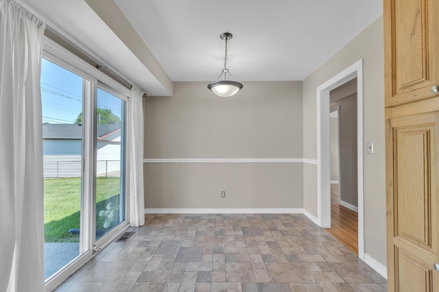 9623 Fairfield St, Livonia, MI 48150 - spare room with light stone finish flooring and baseboards