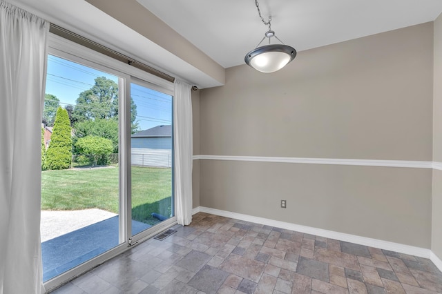 9623 Fairfield St, Livonia, MI 48150 - unfurnished dining area with stone finish floors
