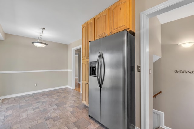 9623 Fairfield St, Livonia, MI 48150 - kitchen with stainless steel refrigerator with ice dispenser, stone tile flooring, and decorative light fixtures