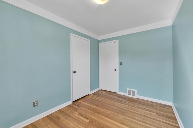 9623 Fairfield St, Livonia, MI 48150 - empty room with baseboards and light wood finished floors