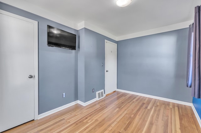 9623 Fairfield St, Livonia, MI 48150 - unfurnished bedroom featuring light wood finished floors
