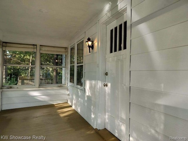 1828 N Lafayette Ave, Royal Oak, MI 48073 - unfurnished sunroom with wood finished floors