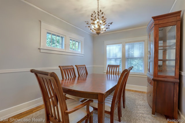 1828 N Lafayette Ave, Royal Oak, MI 48073 - dining space with crown molding, a chandelier, and light wood-type flooring