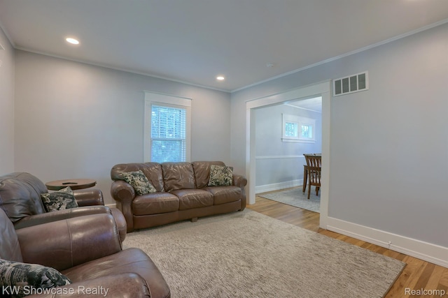 1828 N Lafayette Ave, Royal Oak, MI 48073 - living area featuring ornamental molding, light wood finished floors, and recessed lighting