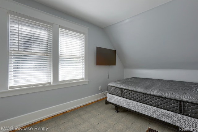 1828 N Lafayette Ave, Royal Oak, MI 48073 - bedroom with vaulted ceiling and wood finished floors