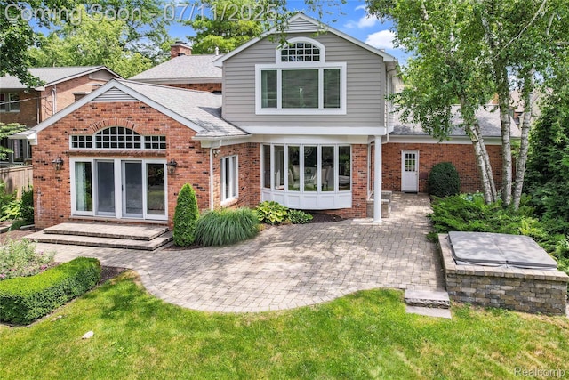 425 Fairfax St, Birmingham, MI 48009 - back of property featuring brick siding and a patio