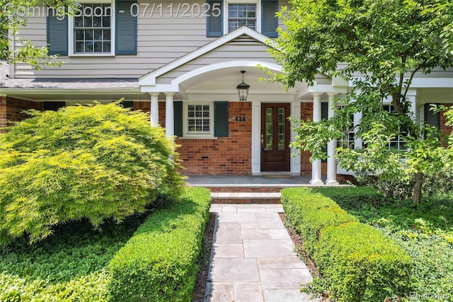 425 Fairfax St, Birmingham, MI 48009 - property entrance with brick siding and a porch