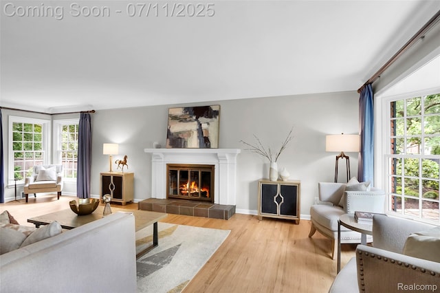 425 Fairfax St, Birmingham, MI 48009 - living area with a tiled fireplace and wood finished floors