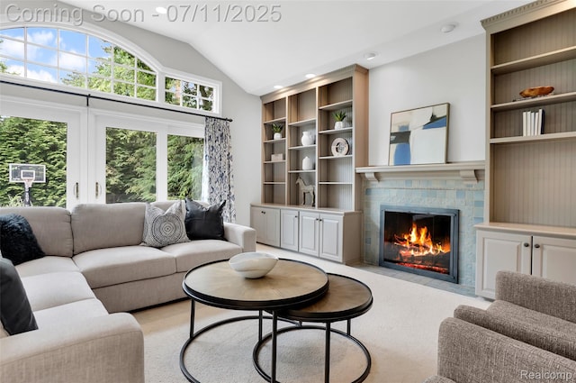 425 Fairfax St, Birmingham, MI 48009 - living room with a fireplace, lofted ceiling, built in features, and light colored carpet
