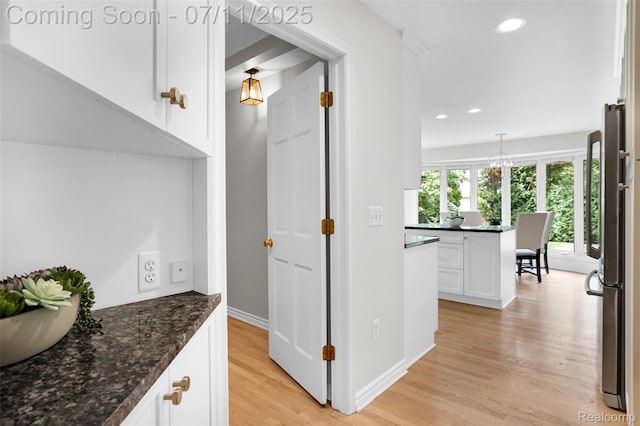425 Fairfax St, Birmingham, MI 48009 - corridor featuring light wood finished floors, recessed lighting, and a chandelier