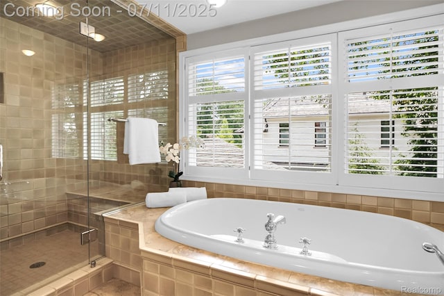 425 Fairfax St, Birmingham, MI 48009 - full bathroom featuring a bath, a shower stall, and tile patterned floors
