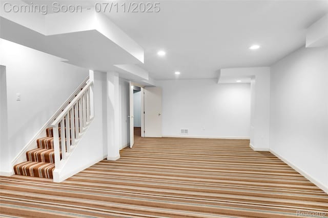 425 Fairfax St, Birmingham, MI 48009 - finished below grade area featuring recessed lighting, carpet flooring, and stairs