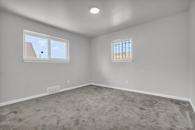 19155 Gallagher St, Detroit, MI 48234 - carpeted empty room with baseboards