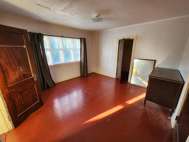 1110 Watkins St SE, Grand Rapids, MI 49507 - unfurnished bedroom with a textured ceiling and wood finished floors