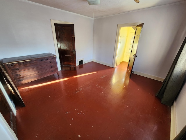1110 Watkins St SE, Grand Rapids, MI 49507 - unfurnished bedroom featuring ornamental molding and wood finished floors