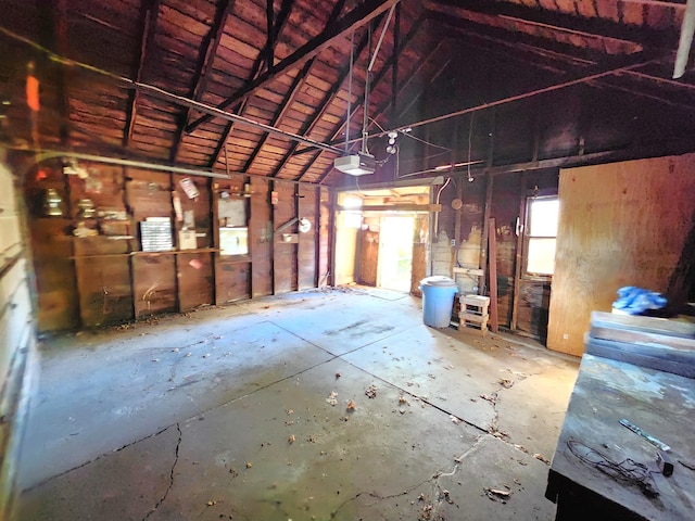 1110 Watkins St SE, Grand Rapids, MI 49507 - miscellaneous room with a garage and vaulted ceiling