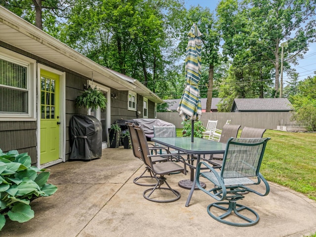 5674 Brunswick Blvd, Waterford, MI 48327 - view of patio with outdoor dining area and a grill