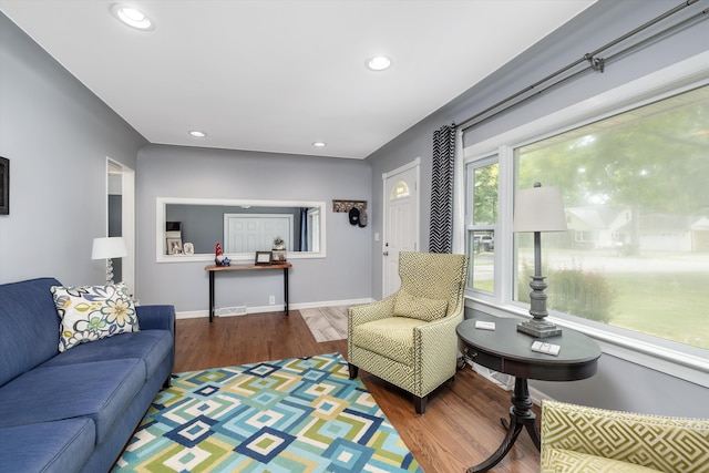 5674 Brunswick Blvd, Waterford, MI 48327 - living area with wood finished floors and recessed lighting