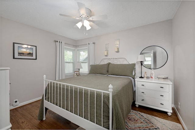 5674 Brunswick Blvd, Waterford, MI 48327 - bedroom with dark wood-style floors and a ceiling fan