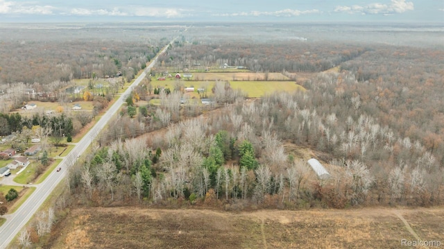 14108 Sheridan Rd, Montrose, MI 48457 - aerial view of property and surrounding area featuring a heavily wooded area