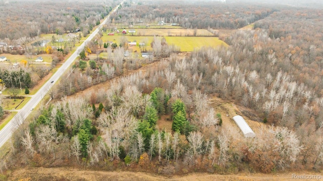 14108 Sheridan Rd, Montrose, MI 48457 - aerial overview of property's location with a heavily wooded area
