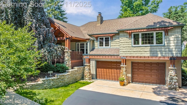 25740 Farmbrook Rd, Southfield, MI 48034 - view of front facade with driveway, a shingled roof, an attached garage, and a chimney