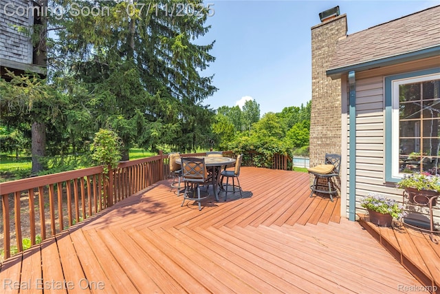 25740 Farmbrook Rd, Southfield, MI 48034 - wooden terrace with outdoor dining area