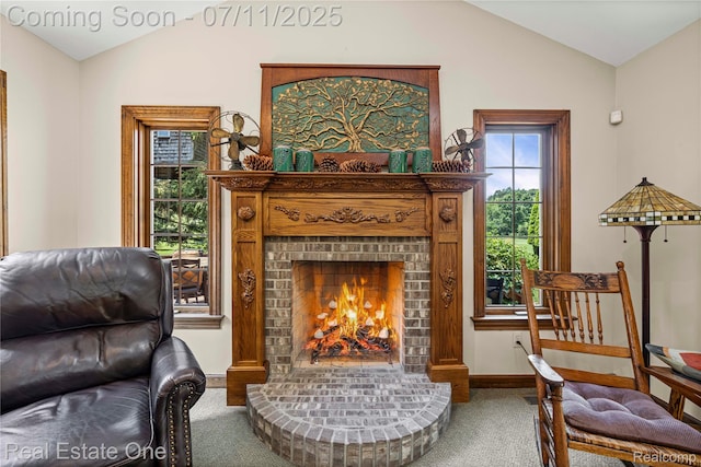 25740 Farmbrook Rd, Southfield, MI 48034 - sitting room with lofted ceiling, carpet, and a fireplace