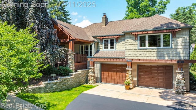 25740 Farmbrook Rd, Southfield, MI 48034 - view of front of house featuring a shingled roof, concrete driveway, a chimney, and a garage