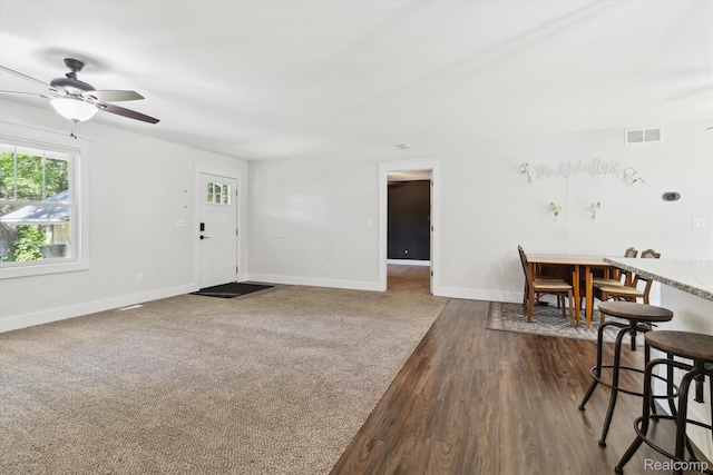 3416 Abbottsford Rd, Clyde, MI 48049 - entryway featuring ceiling fan and dark wood-style floors
