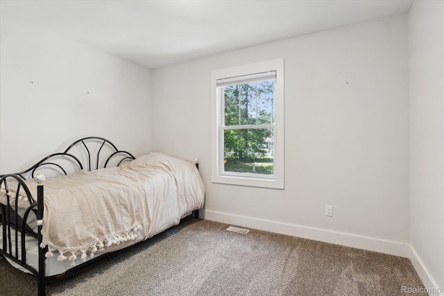 3416 Abbottsford Rd, Clyde, MI 48049 - bedroom with carpet flooring and baseboards