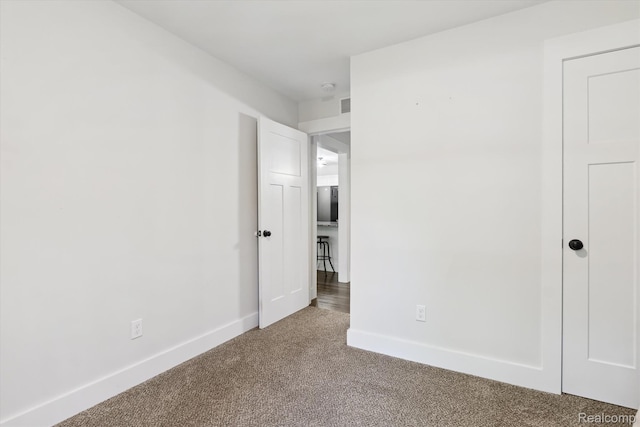 3416 Abbottsford Rd, Clyde, MI 48049 - unfurnished bedroom featuring carpet and baseboards