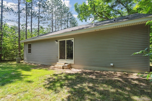 3416 Abbottsford Rd, Clyde, MI 48049 - back of property featuring entry steps and a lawn