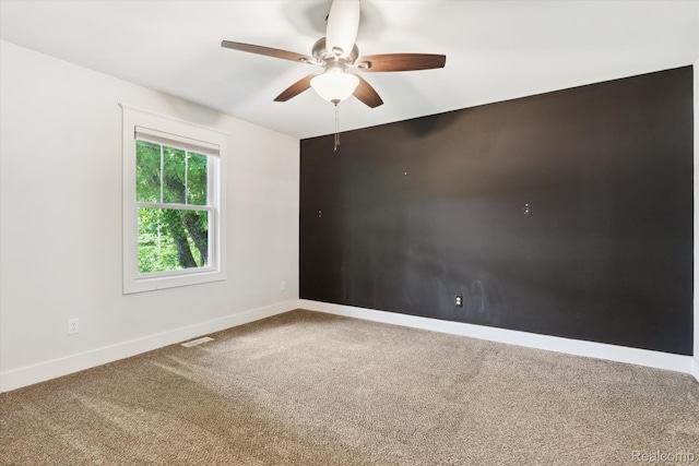 3416 Abbottsford Rd, Clyde, MI 48049 - unfurnished room featuring carpet floors and a ceiling fan