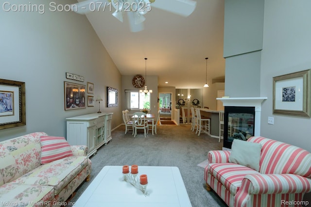 61001 Evergreen Ct, South Lyon, MI 48178 - carpeted living area featuring a ceiling fan, high vaulted ceiling, and a multi sided fireplace