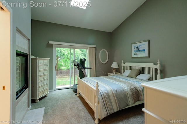 61001 Evergreen Ct, South Lyon, MI 48178 - bedroom featuring access to exterior, carpet, and vaulted ceiling