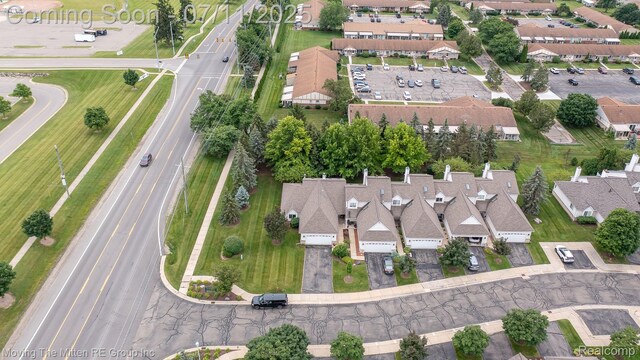 61001 Evergreen Ct, South Lyon, MI 48178 - aerial overview of property's location with nearby suburban area