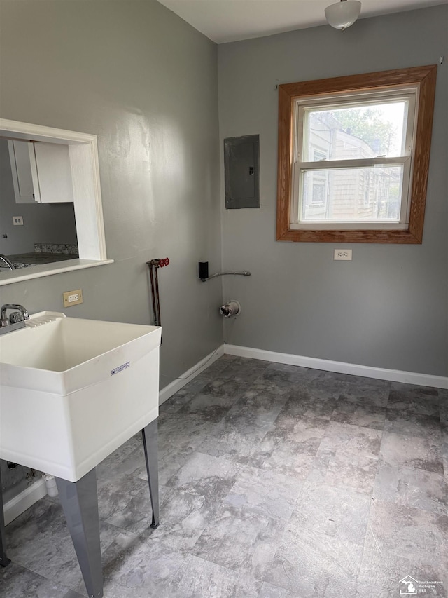 6114 Hazel St, Taylor, MI 48180 - bathroom featuring electric panel and baseboards