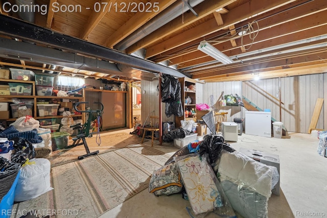 11857 Ely Rd, Davisburg, MI 48350 - unfinished basement with refrigerator