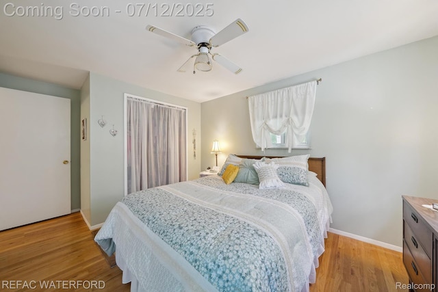 11857 Ely Rd, Davisburg, MI 48350 - bedroom featuring light wood finished floors and a ceiling fan
