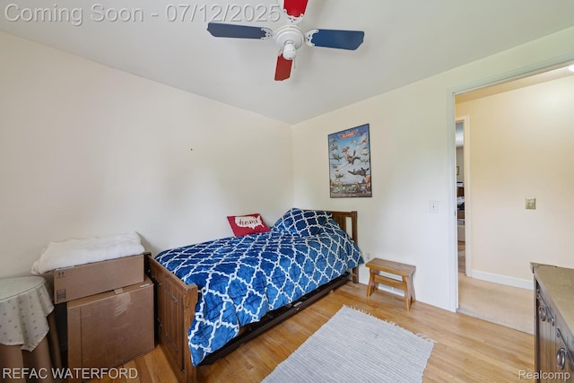 11857 Ely Rd, Davisburg, MI 48350 - bedroom with light wood-style flooring and a ceiling fan