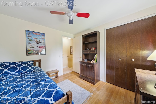 11857 Ely Rd, Davisburg, MI 48350 - bedroom featuring light wood-type flooring, ceiling fan, and a closet