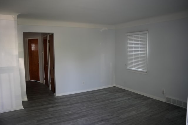 6422 Evergreen Rd, Detroit, MI 48228 - unfurnished room featuring dark wood finished floors and baseboards