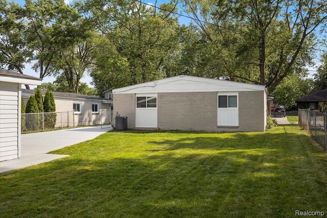 22809 Detour St, Macomb, MI 48082 - rear view of house with brick siding